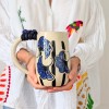 Pichet fleurs de mariage rayé bleu et noir