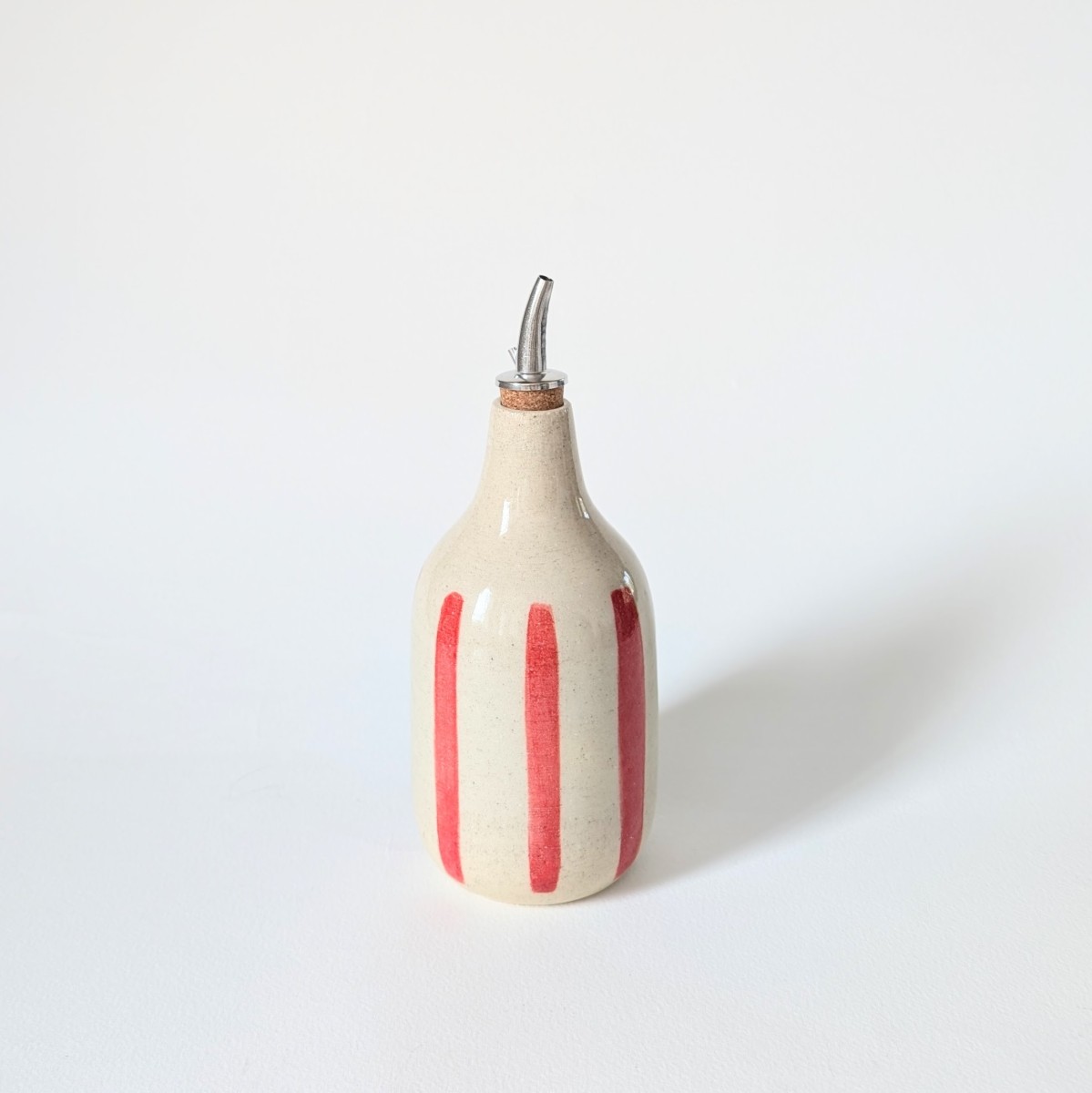 Huilier rayé rouge